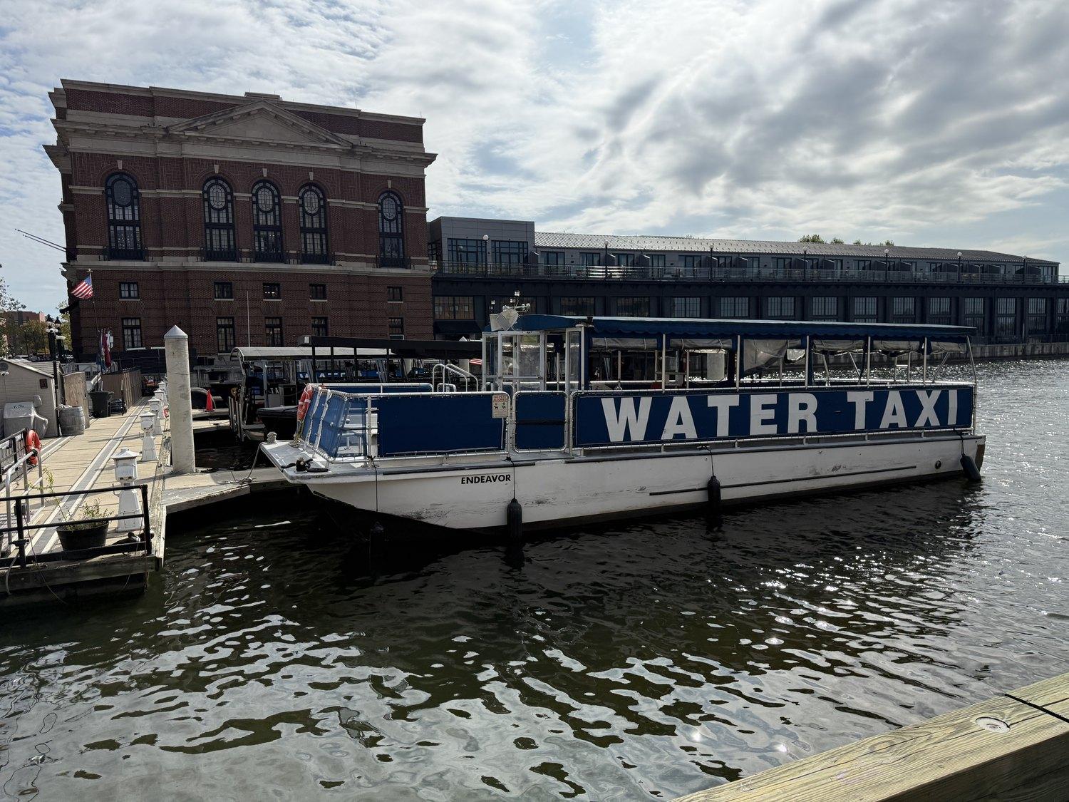 The water taxi Endeavor tied up at the Fell's Point landing, the Recreation Pier behind her