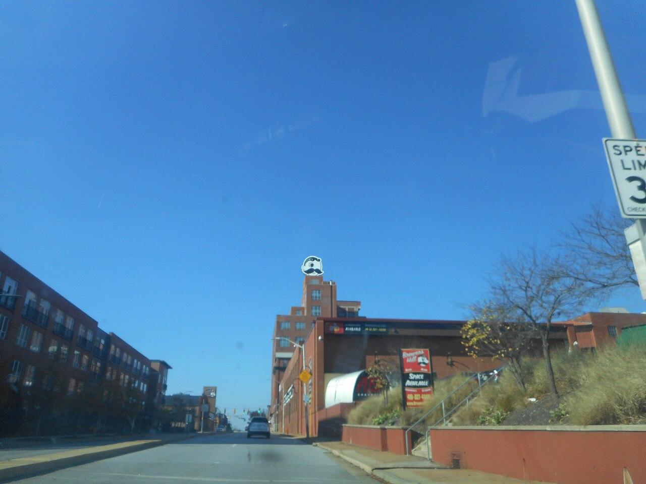 O'Donnell Street in Brewers Hill, the old National Brewing buildings with the Natty Boh tower at the top of the hill