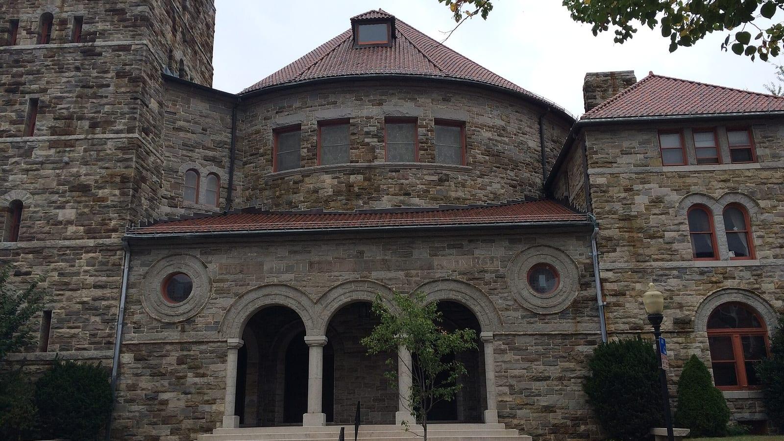 The stone entrance and rotunda of Lovely Lane United Methodist Church on St Paul Street