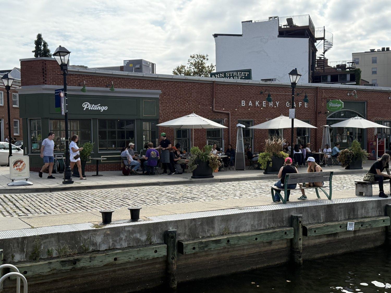 Pitango on Ann Street Wharf, tables and umbrellas out along the water